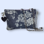 POCHETTE IN DENIM CON ROSE E PELLE CAVALLINO LAMINATO