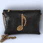 POCHETTE IN PELLE, CON NOTA MUSICALE RICAMATA, CON PIETRE, SWAROVSKI E FINITURE METALLICHE